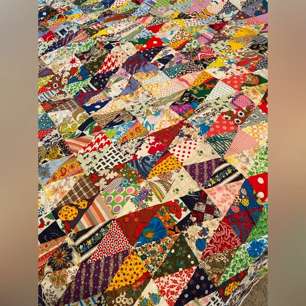 Vintage hand made quilt triangular fabric with solid reverse side